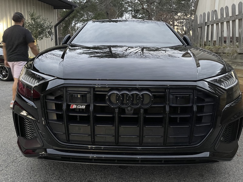 Black Audi parked outside Euromotion independent European auto repair shop in Raleigh