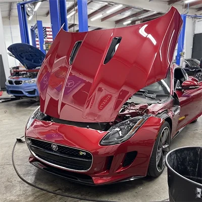 red jaguar in raleigh, nc getting european car services to maintain performance and increase engine efficiency. transmission repair and service, factory parts and warranty on all repairs. best european car garage, top service center european cars.