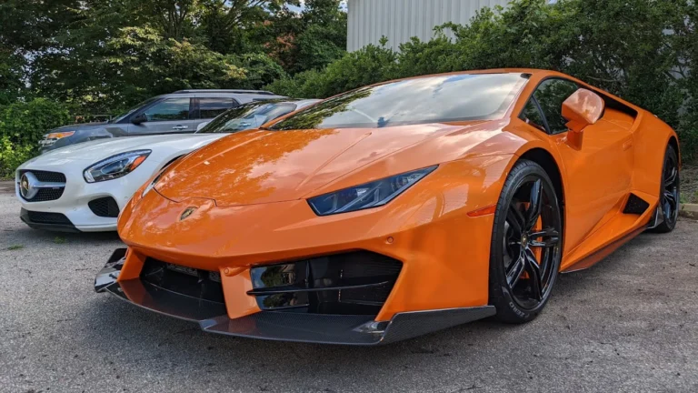 Orange Lamborghini Huracán parked outdoors